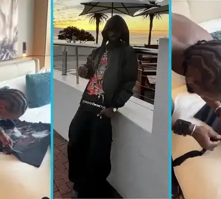 Black Sherif Turns Regular T-shirt Into Crop Top, Cuts It With Scissors In The Video Below